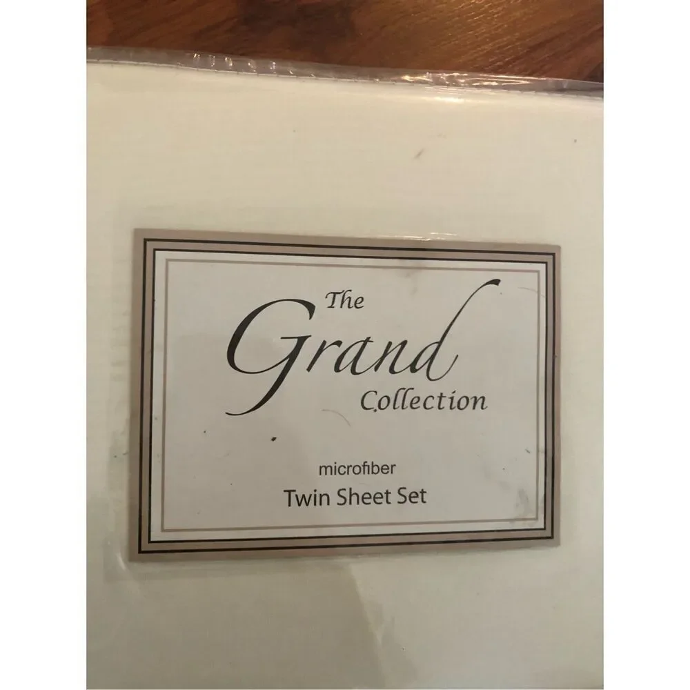 The Grand Collection Cream color three piece twin sheet set microfiber polyester